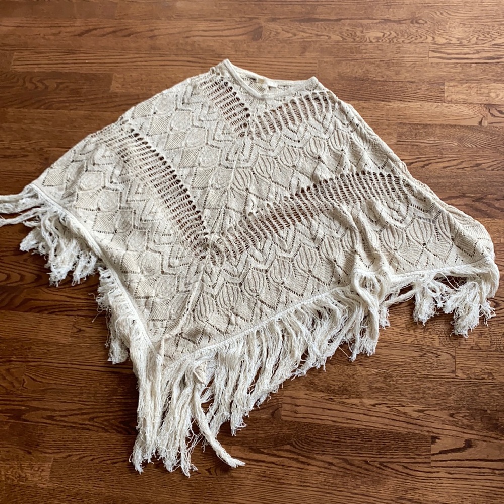 Maje crochet poncho